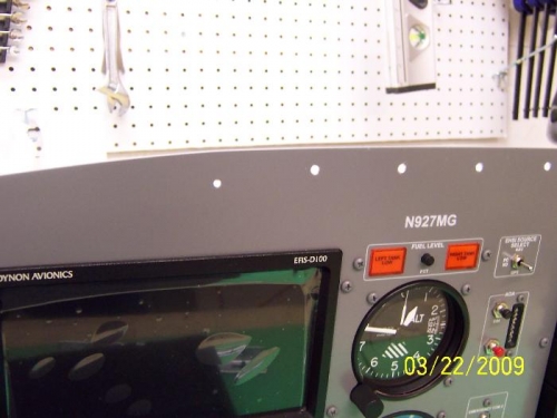 Screw holes drilled in the instrument panel