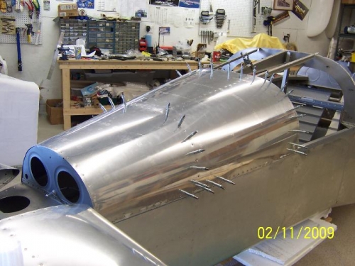 Aft top skin partially riveted in place