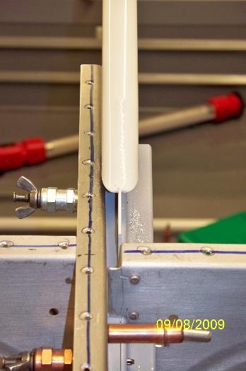 The center support bar in place between the wedge and the bracket