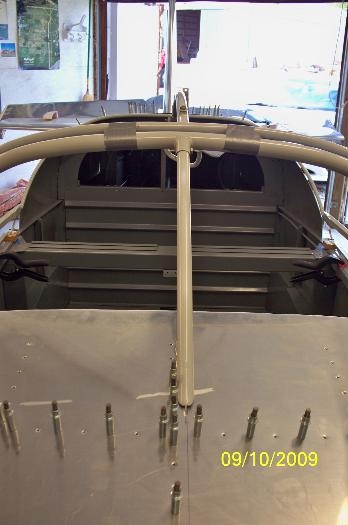 Front view-Support arm thru the top skin