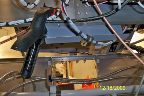 The control cable bracket clamped in place