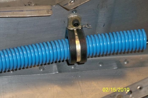 The left wire tube clamped in place