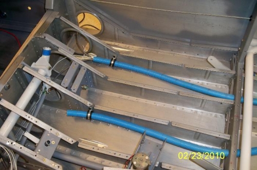 The blue tubes clamped in place