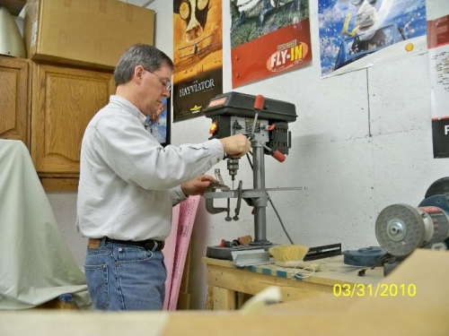 Drilling the canopy rail in the drill press
