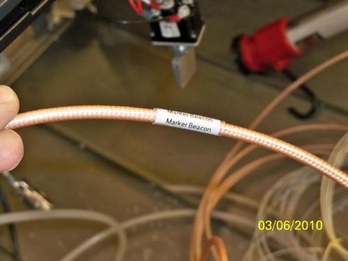 Label attached to a coax wire