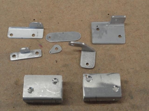Components of the tip-up mod and the aft brackets