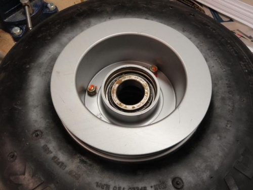 The wheel bearing in place on the wheel
