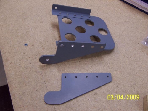 The old and the new rudder pedal attach bracket