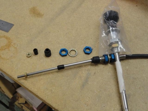 The components of the throttle and mixture cables removed