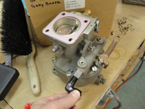 Carburetor and the fuel line fitting