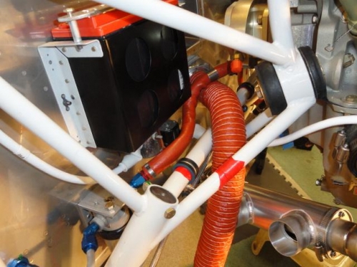 The fuel line hose between the gascolator and the fuel pump