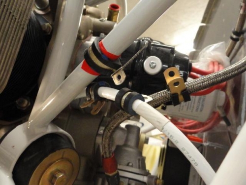 The ground cable and fuel line hose to the transducer