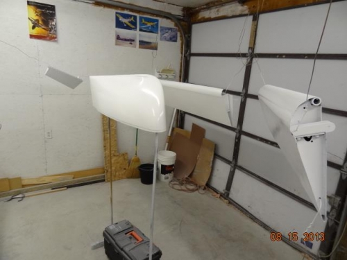 The trim tab, wing tip, flap and left aileron painted