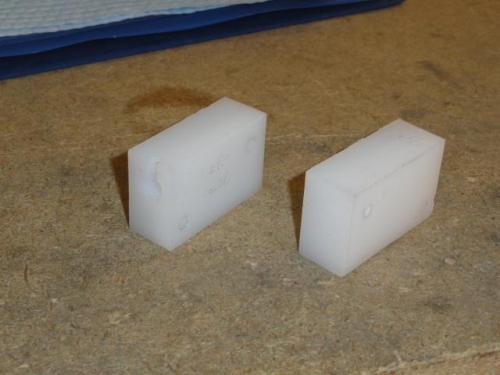 The replacement canopy anchor block (right) and the original block (left)