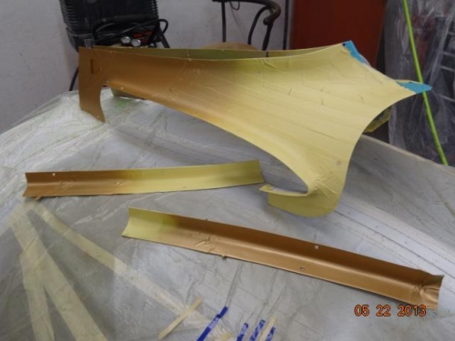 The empennage fairing with gold paint