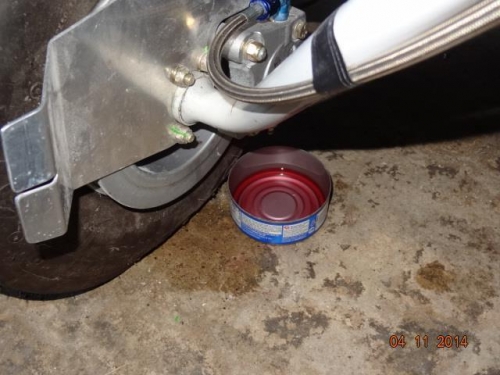 A tuna can was used to catch the brake fluid