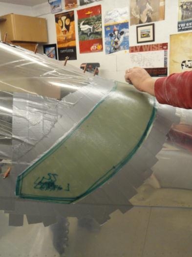 The left side of the fiberglass fairing laid in place