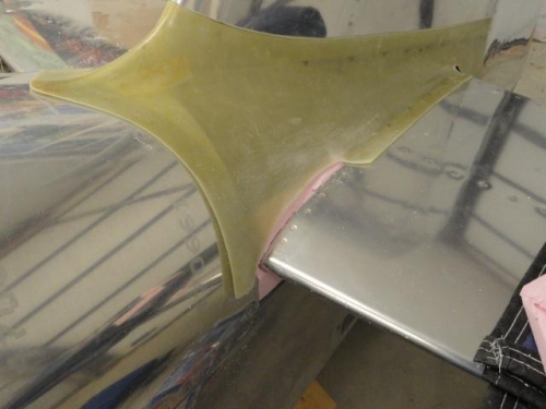 The fairing flange trimmed off and the edges sanded