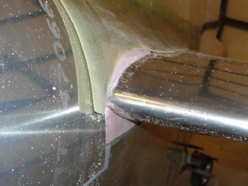 The fairing lays over the insulation