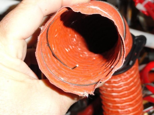 The wire end bent and pushed into the tubing