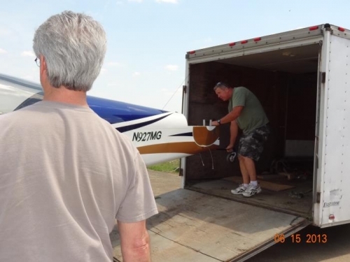 Jeff carrying the fuselage out of the trailer