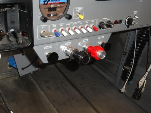 The control cables on the instrument panel bracket