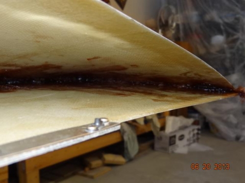 The epoxy resin and cloth in the wing tip