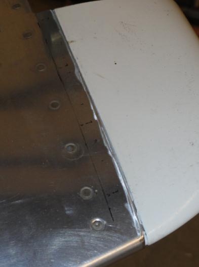 One edge filed to transition to the fairing