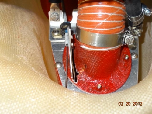 The carb heat inlet with the indent for the B-nut