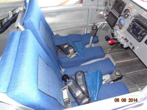 The seat cushions and seat belts in place