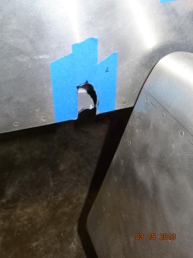 The right hole in the fuselage