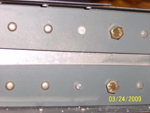 The replaced rivet in the HS rear spar