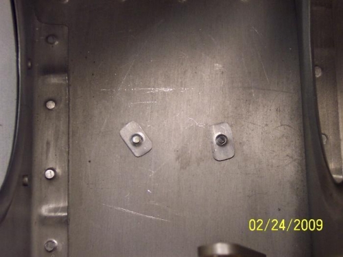 Spacers riveted in original holes for the #1 comm antenna