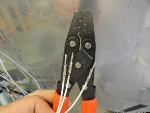 The Molex crimper with the first three wire connectors crimped for the P-1 connector