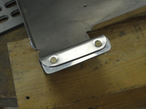 One of the flanges/doublers riveted together