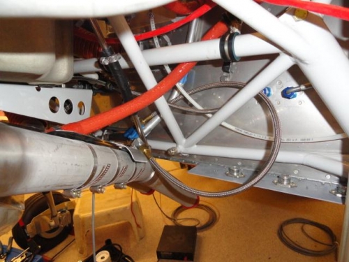 One of the smoke system injector hoses laid in the engine compartment