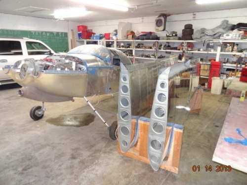 Fuselage and wings in the garage