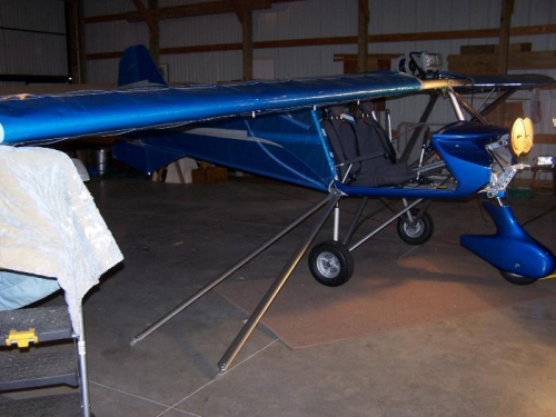 After left wing is on and right is ready for struts