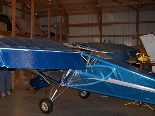 after wings are installed.  The wings are installed with the flaps and ailerons off.