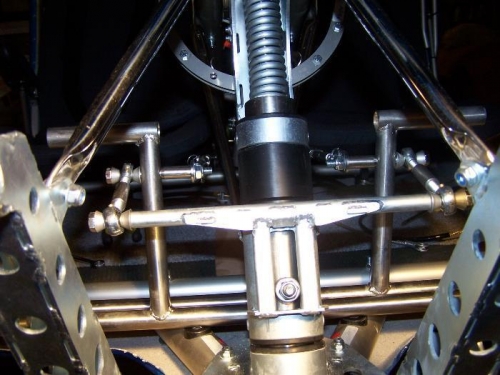 Note the bolt that runs through the bushing