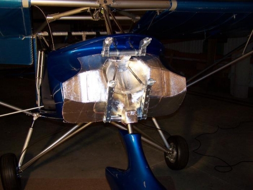 After riveting and applying heat reflective material