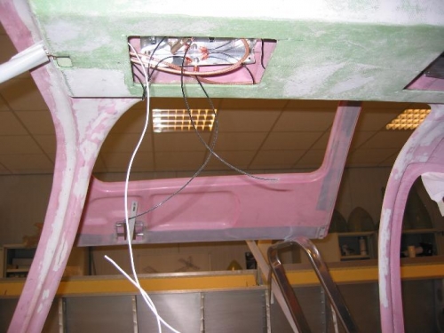 Inside of the door and a view of the overhead console with acces hatch to one of the GPS antennas