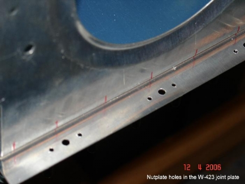 Nutplate holes drilled in W-423 joint plate