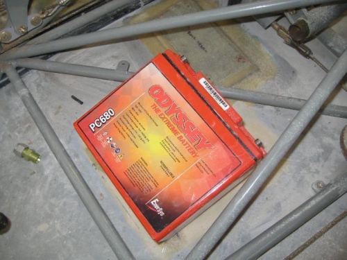Battery installed under pass seat