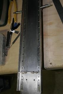 riveted doubler and spar caps to spar