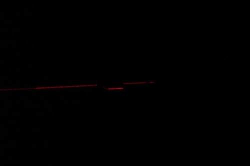 turned lights off to show up laser beam in photo