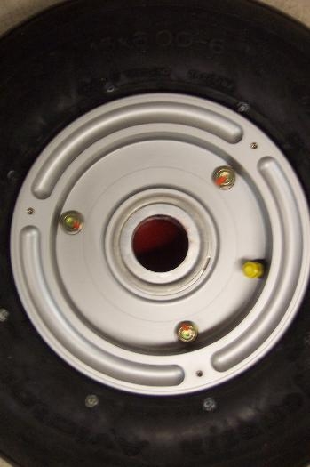 tire mounted, nuts torqued and marked with torque seal