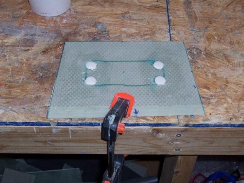ground out holes for micro pads in magnetometer shelf