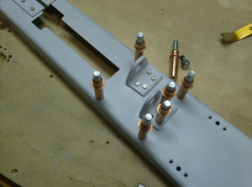 Riveting  cable brackets to the mount