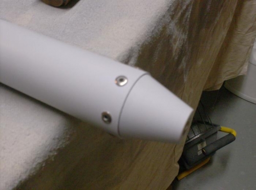 Rod end riveted in-place